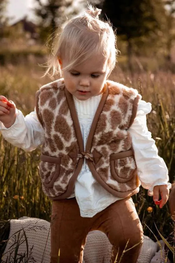 Wollen bodywarmer giraf